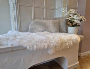 En eller flere senge i et værelse på Ferienwohnungen Auszeit Taubertal