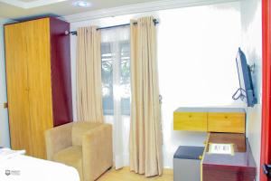 Μια τηλεόραση ή/και κέντρο ψυχαγωγίας στο Fudan International Hotel and Resort