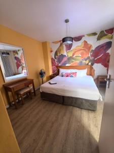 En eller flere senge i et værelse på Unit 47 Oceanic