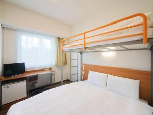 Postel nebo postele na pokoji v ubytování Comfort Inn Nagasaki Airport