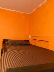 Postel nebo postele na pokoji v ubytování C'est La Vie + 8 fotografií