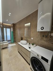 Koupelna v ubytování My Rooms Hotel + 120 fotografií