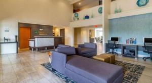 a large living room with a couch and a bar at Quality Inn Danville in Danville