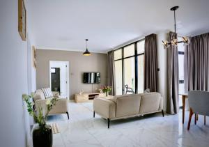 Χώρος καθιστικού στο Le Basilic Hotel Apartment & Spa