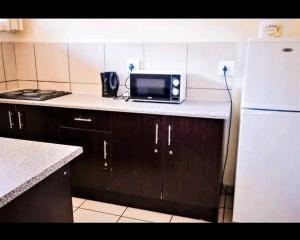 Kuchyň nebo kuchyňský kout v ubytování Elimu house + 4 fotografie