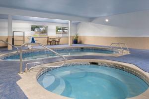 a hot tub in a hotel room at Days Inn by Wyndham Las Vegas in Las Vegas