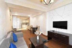 Μια τηλεόραση ή/και κέντρο ψυχαγωγίας στο Mandarin apartments