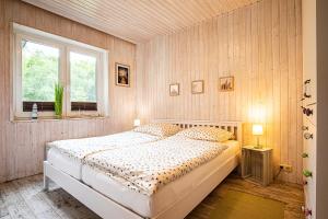 Ένα ή περισσότερα κρεβάτια σε δωμάτιο στο Fasanenest