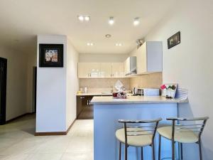 Η κουζίνα ή μικρή κουζίνα στο Mandarin apartments +25 φωτογραφίες