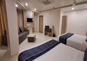 Μια τηλεόραση ή/και κέντρο ψυχαγωγίας στο Ekansh Hotels And Resorts