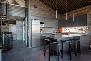 Kuchyň nebo kuchyňský kout v ubytování Ski-inn Pyhälinna Deluxe Villas