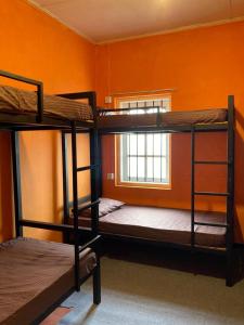 Ένα ή περισσότερα κρεβάτια σε δωμάτιο στο C'est La Vie