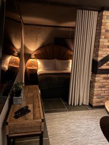 Ένα ή περισσότερα κρεβάτια σε δωμάτιο στο Parkside studio