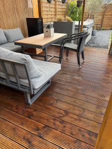 Posezení v ubytování Gemütliches Haus mit Whirlpool & Kamin + 2 fotografie