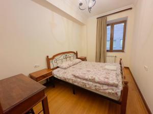 Ένα ή περισσότερα κρεβάτια σε δωμάτιο στο Hatis apartment