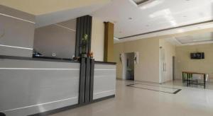 Kuchyň nebo kuchyňský kout v ubytování MANDARI HOTEL SINGARAJA