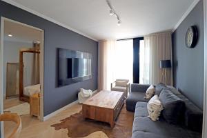 TV a/nebo společenská místnost v ubytování Thango Executives Gallileo Ellipse