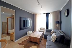 TV a/nebo společenská místnost v ubytování Thango Executives Gallileo Ellipse