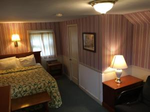 Postel nebo postele na pokoji v ubytování Doray Motel Lake George