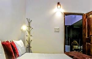 Ένα ή περισσότερα κρεβάτια σε δωμάτιο στο Marari brezza homestay +56 φωτογραφίες