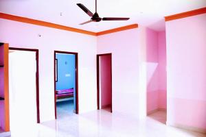 Voodi või voodid majutusasutuse Ramana Maharshi Guest House toas