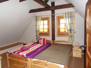 Ένα ή περισσότερα κρεβάτια σε δωμάτιο στο Ferienwohnanlage John