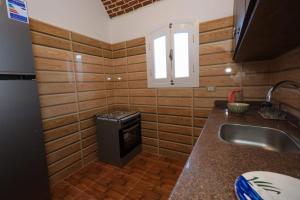 Kuchyň nebo kuchyňský kout v ubytování Beit Al Madina