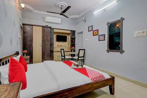 Postel nebo postele na pokoji v ubytování Hotel O BlackBull