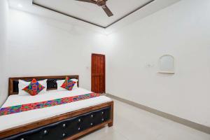 Ένα ή περισσότερα κρεβάτια σε δωμάτιο στο Hotel Purshottam Palace +20 φωτογραφίες