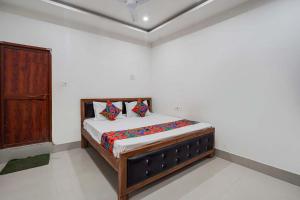 Ένα ή περισσότερα κρεβάτια σε δωμάτιο στο Hotel Purshottam Palace