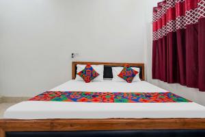 Ένα ή περισσότερα κρεβάτια σε δωμάτιο στο Hotel Purshottam Palace