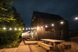 Φωτογραφία από το άλμπουμ του Schody do wody linia brzegowa jeziora Kaszuby σε Roztoka