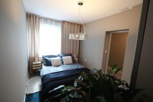 Ένα ή περισσότερα κρεβάτια σε δωμάτιο στο W28 Winterova