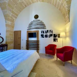 Ένα ή περισσότερα κρεβάτια σε δωμάτιο στο CasaFrancisa Dimora storica 1830