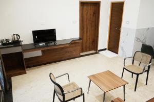 Μια τηλεόραση ή/και κέντρο ψυχαγωγίας στο The President Hotel, Tumkur