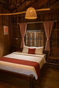 Ένα ή περισσότερα κρεβάτια σε δωμάτιο στο Gecko Guesthouse