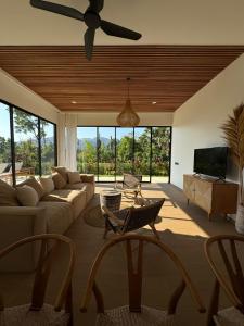 TV a/nebo společenská místnost v ubytování Julim Flora - Eco Villa