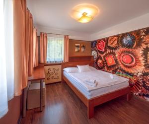 Ένα ή περισσότερα κρεβάτια σε δωμάτιο στο Penzion 21