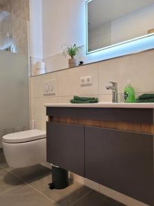 Ένα μπάνιο στο Ferienwohnung Obstgarten