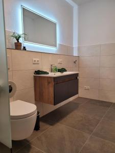 Ένα μπάνιο στο Ferienwohnung Obstgarten