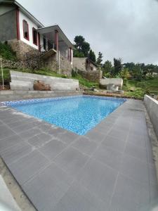 Bazén v ubytování Mehar villa nebo v jeho okolí