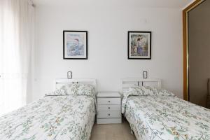 Кровать или кровати в номере Apartaments CENTRAL PARK +27 фотографий