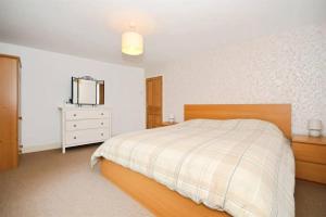 Ένα ή περισσότερα κρεβάτια σε δωμάτιο στο Rock View Cottage +14 φωτογραφίες