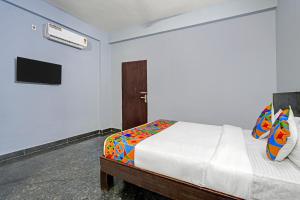 Ένα ή περισσότερα κρεβάτια σε δωμάτιο στο Via Luxury Suites - Padmavathi Meenakshi Kalyana Mantapa, Road Shivanna Layout +16 φωτογραφίες