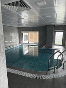 Bazén v ubytování Zurich Homestay Vinhome Ocean Park nebo v jeho okolí