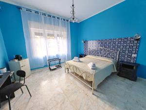 Postel nebo postele na pokoji v ubytování B&B Amàre