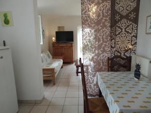 Ένα ή περισσότερα κρεβάτια σε δωμάτιο στο le jouc