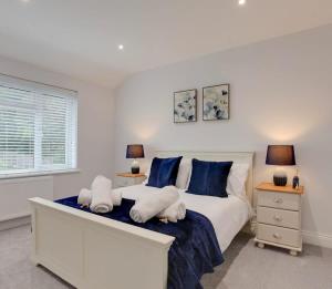 Voodi või voodid majutusasutuse 3 Bed Sleeps 5 Private Parking Garden toas