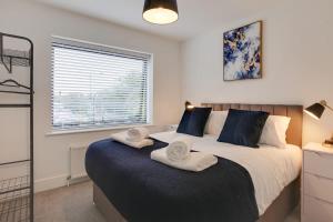 Voodi või voodid majutusasutuse Surehaven Stays 4 Bedroom House Braintree toas