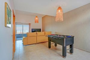 Μια τηλεόραση ή/και κέντρο ψυχαγωγίας στο Villa sunrise- a restful getaway